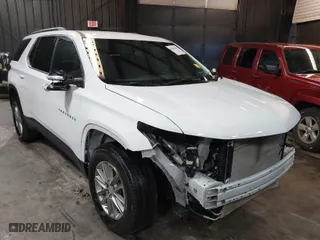 2023 Chevrolet Traverse LT Cloth with VIN 1GNERGKW5PJ214242, listed as a IAAI auction lot 41883690 with 36,341 mi miles. Bid and sale history available at carsss.com. Image 1.