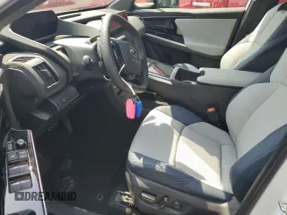 2024 Subaru Solterra Premium с VIN JTMABABA3RA053017, выставлен на аукционе Copart как лот 56164175 с пробегом 7 885 миль миль и Списание • Salvage title. История ставок и продаж доступна на DreamBid. Изображение 7.