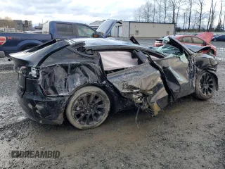 2023 Tesla Model Y Long Range with VIN 7SAYGAEE0PF832185, listed as a Copart auction lot 85159764 with Not Provided miles and Salvage Title. Bid and sale history available at DreamBid. Image 3.