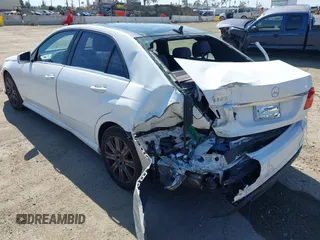 2013 Mercedes-Benz E-Class E 350 Luxury with VIN WDDHF5KB7DA739935, listed as a IAAI auction lot 41847836 with 136,783 mi miles. Bid and sale history available at carsss.com. Image 3.