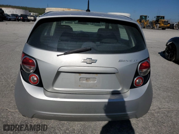 2014 Chevrolet Sonic LT with VIN 1G1JC6SH0E4213296, listed as a Copart auction lot 52858575 with 106,050 mi miles and Clean Title. Bid and sale history available at carsss.com. Image 6.