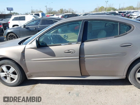 2006 Pontiac Grand Prix z VIN 2G2WP552X61161972, wystawiony jako IAAI lot #41825581 z przebiegiem 264 069 mil mil oraz . Historia ofert i sprzedaży dostępna na DreamBid. Obrazek 14.