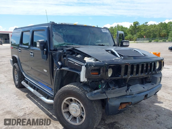 2007 Hummer H2 SUV z VIN 5GRGN23U57H112295, wystawiony jako IAAI lot #42257618 z przebiegiem 183 991 mil mil oraz . Historia ofert i sprzedaży dostępna na DreamBid. Obrazek 6.