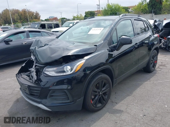 2020 Chevrolet Trax LT with VIN 3GNCJLSB8LL221077, listed as a IAAI auction lot 42421378 with 97,372 mi miles and . Bid and sale history available at DreamBid. Image 2.