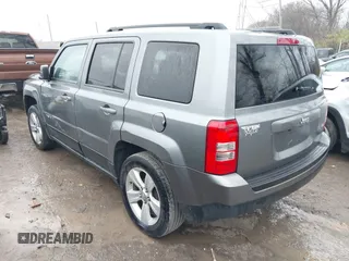 2013 Jeep Patriot Latitude with VIN 1C4NJPFB8DD129848, listed as a IAAI auction lot 40949386 with 168,839 mi miles and . Bid and sale history available at carsss.com. Image 3.