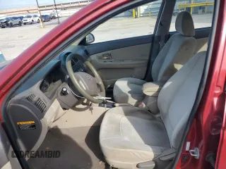 2009 Kia Spectra EX with VIN KNAFE221495646233, listed as a Copart auction lot 69638784 with 168,178 mi miles and Salvage Title. Bid and sale history available at carsss.com. Image 7.