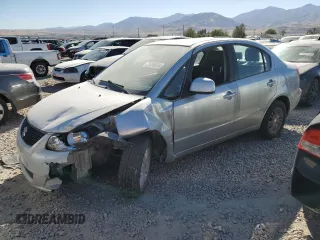 2013 Suzuki SX4 LE with VIN JS2YC5A31D6100472, listed as a Copart auction lot 73356934 with 0 mi miles and Salvage Title. Bid and sale history available at carsss.com. Image 1.