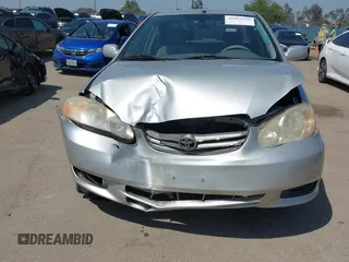 2004 Toyota Corolla CE with VIN 1NXBR32E14Z262676, listed as a IAAI auction lot 41992616 with 168,255 mi miles. Bid and sale history available at carsss.com. Image 12.