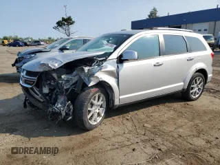 2013 Dodge Journey Crew with VIN 3C4PDCDG0DT591483, listed as a Copart auction lot 59037565 with 220,985 mi miles and Salvage title. Bid and sale history available at DreamBid. Image 1.