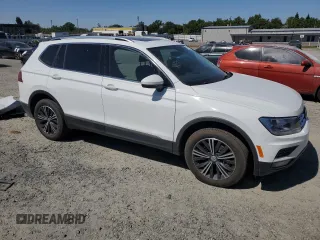 2019 Volkswagen Tiguan SE with VIN 3VV2B7AX5KM009947, listed as a Copart auction lot 54951455 with 90,569 mi miles and Salvage Title. Bid and sale history available at DreamBid. Image 4.