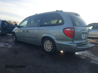2003 Dodge Grand Caravan with VIN 2D4GP443X3R277421, listed as a IAAI auction lot 41035290 with 243,568 mi miles and . Bid and sale history available at DreamBid. Image 3.