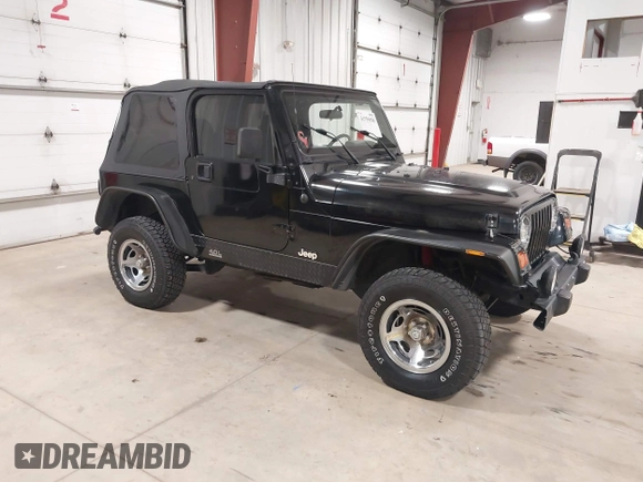 2002 Jeep Wrangler Sport with VIN 1J4FA49S02P704741, listed as a IAAI auction lot 41759558 with 191,126 mi miles. Bid and sale history available at carsss.com. Image 1.