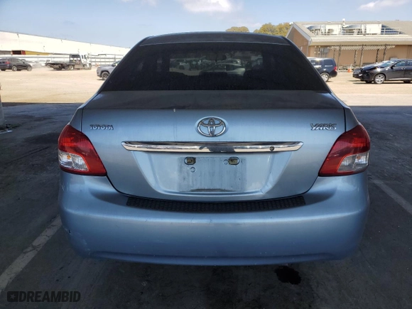 2009 Toyota Yaris with VIN JTDBT903994053624, listed as a Copart auction lot 53906565 with 227,211 mi miles and Salvage Title. Bid and sale history available at carsss.com. Image 6.