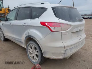 2015 Ford Escape Titanium with VIN 1FMCU9J92FUA60166, listed as a IAAI auction lot 41914080 with 103,122 mi miles and . Bid and sale history available at DreamBid. Image 3.