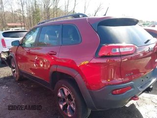 2014 Jeep Cherokee Trailhawk with VIN 1C4PJMBS0EW257133, listed as a IAAI auction lot 41446095 with 82,285 mi miles and . Bid and sale history available at DreamBid. Image 14.