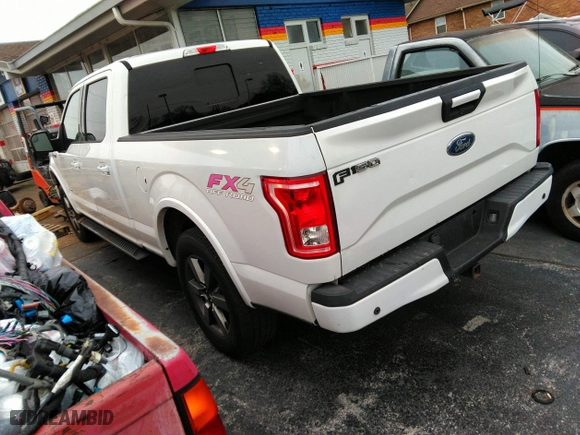2015 Ford F-150 XLT w/HD Payload Pkg with VIN 1FTFW1EG8FFA12438, listed as a IAAI auction lot 41743982 with 174,799 mi miles. Bid and sale history available at carsss.com. Image 3.