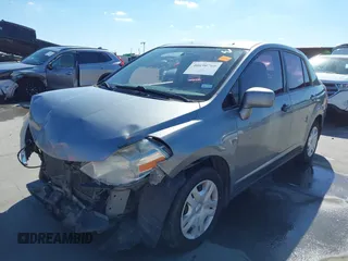2010 Nissan Versa S with VIN 3N1BC1AP2AL394996, listed as a IAAI auction lot 40690760 with 125,972 mi miles and . Bid and sale history available at DreamBid. Image 19.