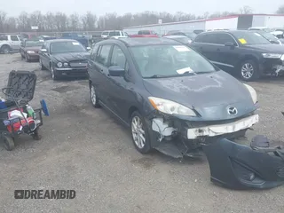 2012 Mazda 5 Touring with VIN JM1CW2CL7C0101862, listed as a IAAI auction lot 41883483 with 176,966 mi miles. Bid and sale history available at carsss.com. Image 1.