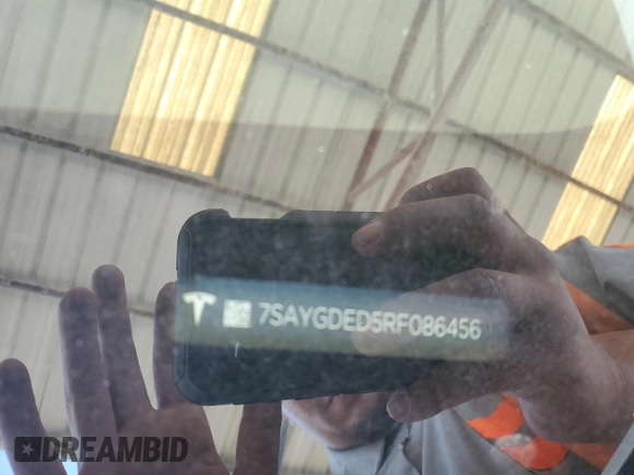 2024 Tesla Model Y с VIN 7SAYGDED5RF086456, выставлен на аукционе Copart как лот 57994835 с пробегом Не указан миль и Списание • Salvage title. История ставок и продаж доступна на DreamBid. Изображение 12.