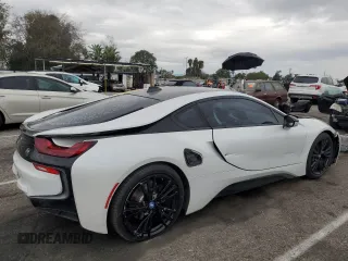 2016 BMW i8 z VIN WBY2Z2C55GV675128, wystawiony jako Copart lot #44595154 z przebiegiem 80 710 mil mil oraz . Historia ofert i sprzedaży dostępna na DreamBid. Obrazek 3.