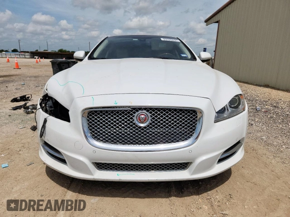 2015 Jaguar XJ Portfolio with VIN SAJWA2GZ7F8V82990, listed as a Copart auction lot 63325535 with 113,892 mi miles and Salvage title. Bid and sale history available at DreamBid. Image 5.