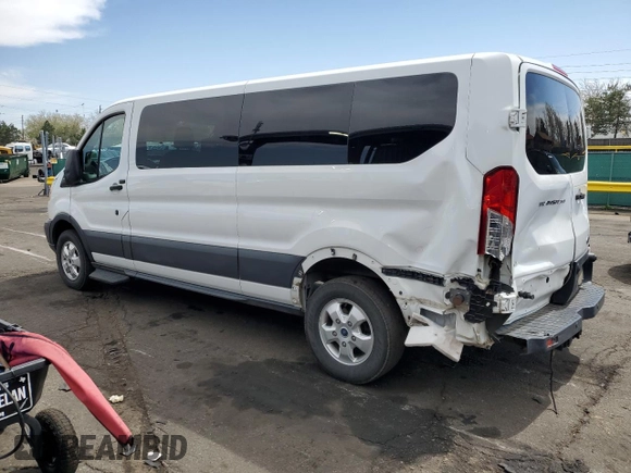2018 Ford Transit Passenger XL with VIN 1FBZX2ZM1JKA86062, listed as a Copart auction lot 52635295 with 85,346 mi miles and Salvage title. Bid and sale history available at DreamBid. Image 2.