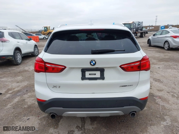 2019 BMW X1 xDrive28i with VIN WBXHT3C51K5L90392, listed as a IAAI auction lot 41571403 with 96,732 mi miles. Bid and sale history available at carsss.com. Image 16.