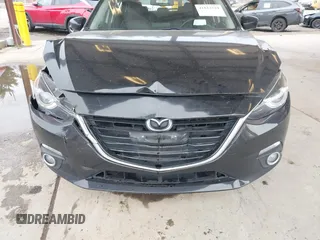 2014 Mazda 3 S Grand Touring with VIN JM1BM1M31E1150126, listed as a IAAI auction lot 41813519 with 103,578 mi miles and . Bid and sale history available at DreamBid. Image 6.