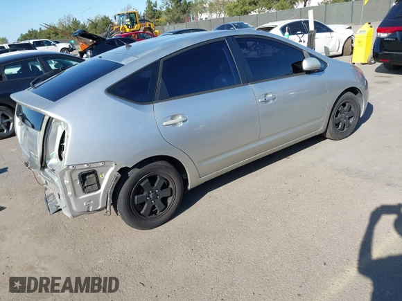 2005 Toyota Prius z VIN JTDKB20UX53080527, wystawiony jako IAAI lot #41831153 z przebiegiem 256 327 mil mil oraz . Historia ofert i sprzedaży dostępna na DreamBid. Obrazek 4.