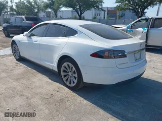 2016 Tesla Model S 70 kWh Battery with VIN 5YJSA1E16GF129997, listed as a IAAI auction lot 42108270 with 1 mi miles. Bid and sale history available at carsss.com. Image 3.
