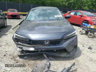 2024 Honda Civic LX z VIN 19XFL2H52RE017237, wystawiony jako Copart lot #56076635 z przebiegiem 20 999 mil mil oraz Szkoda całkowita • Salvage title. Historia ofert i sprzedaży dostępna na DreamBid. Obrazek 5.