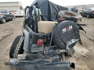 1999 Jeep Wrangler SE with VIN 1J4FY29P7XP484551, listed as a Copart auction lot 86881094 with 0 mi miles and Salvage Title. Bid and sale history available at carsss.com. Image 6.
