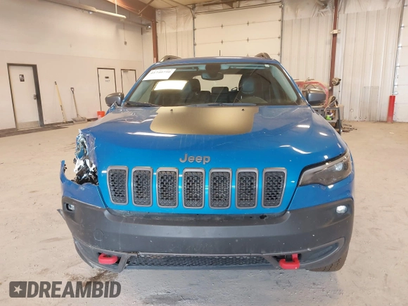 2019 Jeep Cherokee Trailhawk with VIN 1C4PJMBX4KD389637, listed as a IAAI auction lot 41740750 with 46,695 mi miles and . Bid and sale history available at DreamBid. Image 12.