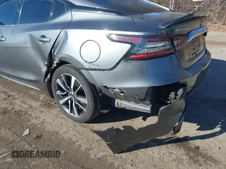 2019 Nissan Maxima SV with VIN 1N4AA6AV4KC373290, listed as a IAAI auction lot 41319597 with 51,698 mi miles and . Bid and sale history available at DreamBid. Image 6.