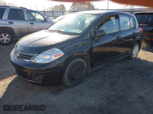 2010 Nissan Versa 1.8 SL with VIN 3N1BC1CP5AL463709, listed as a IAAI auction lot 41614325 with 112,771 mi miles. Bid and sale history available at carsss.com. Image 2.