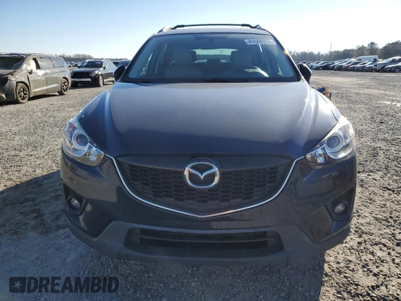 2014 Mazda CX-5 Grand Touring with VIN JM3KE4DY1E0405493, listed as a Copart auction lot 41688915 with 94,970 mi miles and Salvage Title. Bid and sale history available at carsss.com. Image 5.