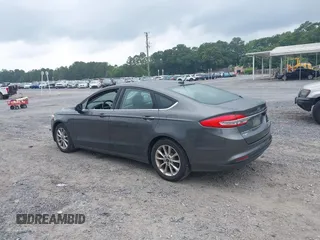2017 Ford Fusion SE z VIN 3FA6P0HD6HR174945, wystawiony jako IAAI lot #42416548 z przebiegiem 128 410 mil mil oraz . Historia ofert i sprzedaży dostępna na DreamBid. Obrazek 3.