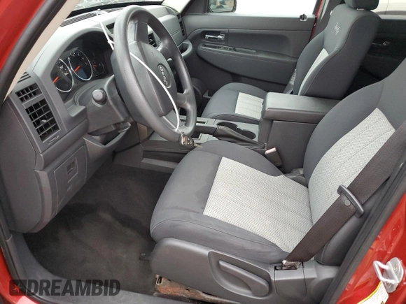 2009 Jeep Liberty Sport with VIN 1J8GN28K89W551684, listed as a Copart auction lot 76122674 with 14,631 mi miles and Salvage Title. Bid and sale history available at DreamBid. Image 7.