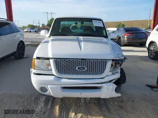 2003 Ford Ranger XL with VIN 1FTYR10U53PB75860, listed as a IAAI auction lot 41953686 with 129,082 mi miles. Bid and sale history available at carsss.com. Image 12.