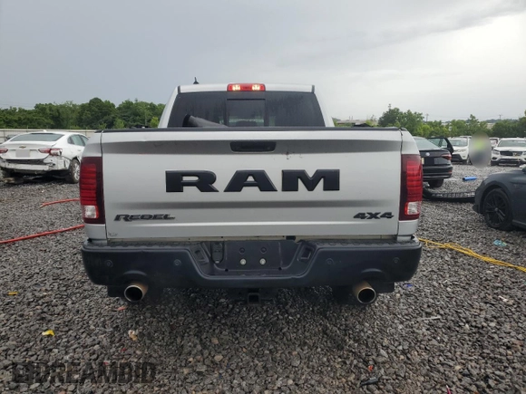 2018 Ram 1500 Rebel with VIN 1C6RR7YT9JS109185, listed as a Copart auction lot 61168115 with 121,482 mi miles and Salvage title. Bid and sale history available at DreamBid. Image 6.
