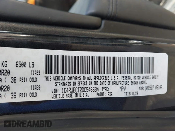 2013 Jeep Grand Cherokee Overland with VIN 1C4RJECT2DC546634, listed as a IAAI auction lot 41180807 with 111,897 mi miles. Bid and sale history available at carsss.com. Image 9.