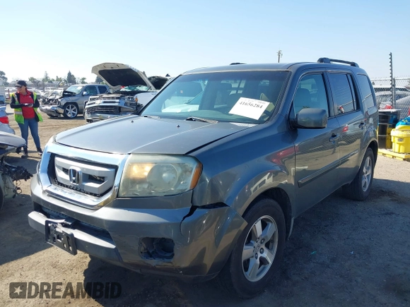 2009 Honda Pilot EX with VIN 5FNYF48439B036957, listed as a IAAI auction lot 41656284 with 199,115 mi miles. Bid and sale history available at carsss.com. Image 2.