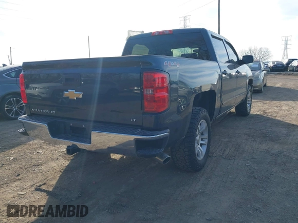 2017 Chevrolet Silverado 1500 LT with VIN 3GCUKREC5HG348435, listed as a IAAI auction lot 41821369 with 140,000 mi miles and . Bid and sale history available at DreamBid. Image 4.