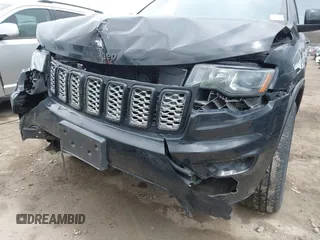 2017 Jeep Grand Cherokee Laredo with VIN 1C4RJFAG7HC886640, listed as a IAAI auction lot 42035301 with 197,110 mi miles. Bid and sale history available at carsss.com. Image 6.