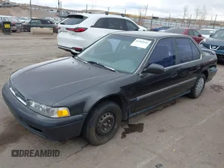 1991 Honda Accord LX with VIN JHMCB7653MC090847, listed as a IAAI auction lot 41561641 with 163,258 mi miles. Bid and sale history available at carsss.com. Image 2.