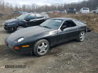 1988 Porsche 928 z VIN WP0JB0921JS860322, wystawiony jako Copart lot #48548495 z przebiegiem 136 427 mil mil oraz Szkody całkowita. Historia ofert i sprzedaży dostępna na DreamBid. Obrazek 1.