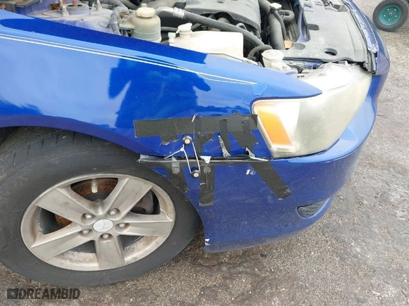 2008 Mitsubishi Lancer DE with VIN JA3AU26U68U037460, listed as a IAAI auction lot 41979573 with 220,238 mi miles. Bid and sale history available at carsss.com. Image 6.