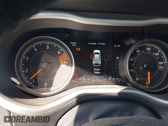 2017 Jeep Cherokee Trailhawk L Plus with VIN 1C4PJMBB6HW654172, listed as a IAAI auction lot 41851236 with 104,263 mi miles. Bid and sale history available at carsss.com. Image 7.