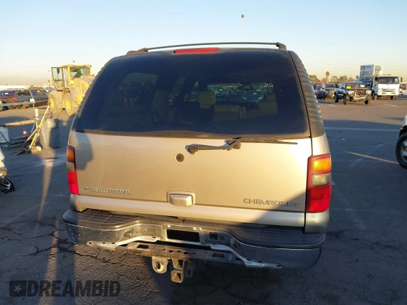 2003 Chevrolet Suburban LS with VIN 1GNEC16T43J269726, listed as a IAAI auction lot 41109855 with 122,820 mi miles. Bid and sale history available at carsss.com. Image 16.