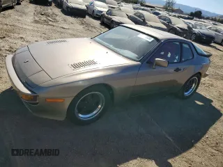 1983 Porsche 944 with VIN WP0AA0948DN454836, listed as a Copart auction lot 77174834 with 5,032 mi miles and Salvage Title. Bid and sale history available at carsss.com. Image 1.